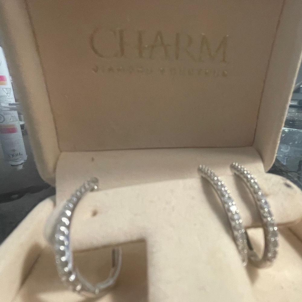 Diamond hoop earrings. White gold . 3 earrings.